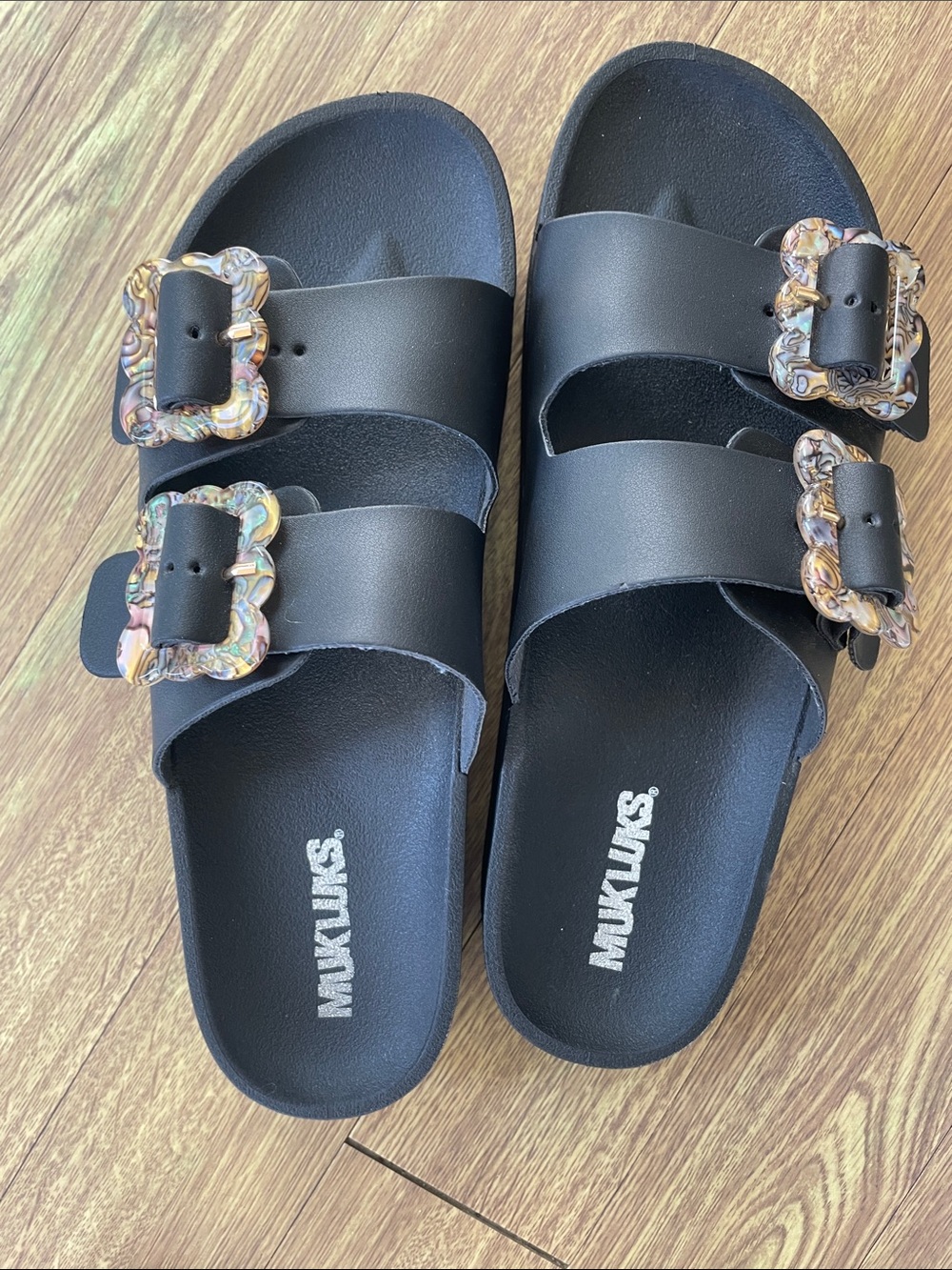 Muk Luks Black Slide Sandals with Marbled Buckles